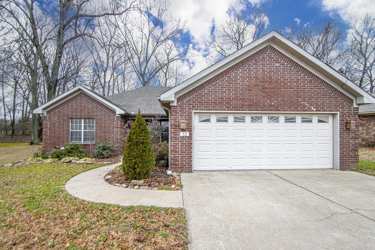 Welcome home! This 3 bed, 2 bath brick home has an extra large kitchen/dining combo. Beautiful cabinetry, under and upper cabinet lighting, updated appliances with spacious dining area. Living room and master feature slate flooring and tray ceilings. Beautiful master bathroom and walk in closet. The fenced in back yard is a must see with deck, pergola with plenty of space for your grills or hot tub. Storm shelter in garage. Schedule your showing today!