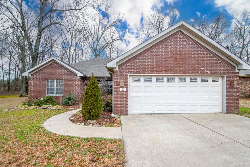 Welcome home! This 3 bed, 2 bath brick home has an extra large kitchen/dining combo. Beautiful cabinetry, under and upper cabinet lighting, updated appliances with spacious dining area. Living room and master feature slate flooring and tray ceilings. Beautiful master bathroom and walk in closet. The fenced in back yard is a must see with deck, pergola with plenty of space for your grills or hot tub. Storm shelter in garage. Schedule your showing today!