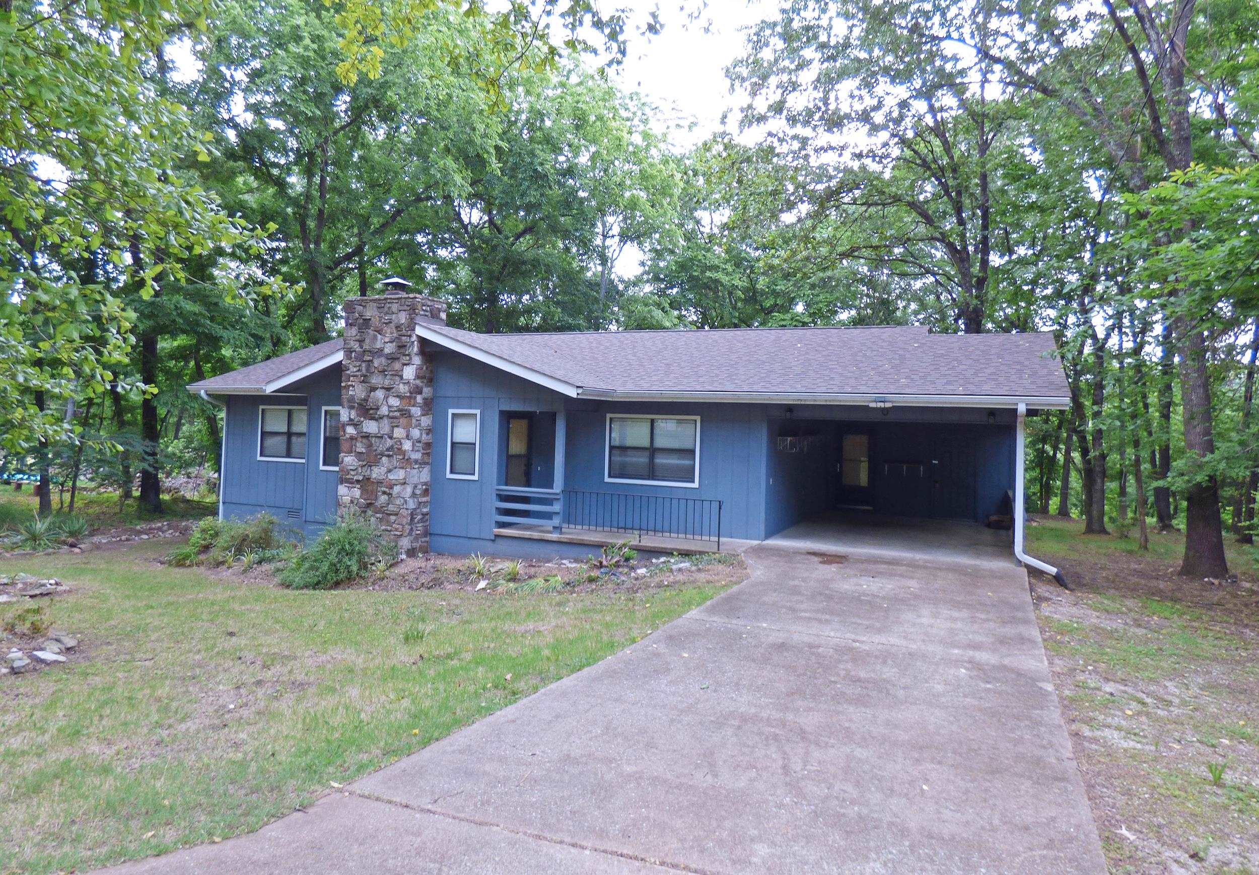 South Fork River Views! This one-level home has 2 bedrooms, 2 baths, bonus room that could be made into another bedroom or office, kitchen with granite countertops, spacious living room with a fireplace, and a screened-in back porch. This house has some great views of the South Fork River from the back. There's a nice sitting area and an area for a firepit. Always wanted a workshop? This has an extra lot perfect to build it. Plus you are cart distance to the beautiful North Golf Course. See this property soon!