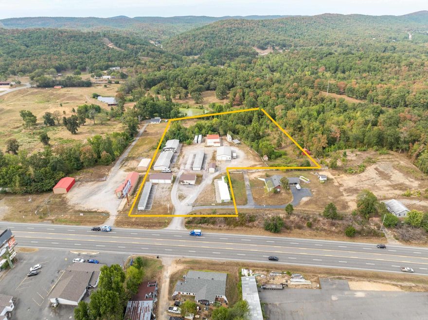 Investors take notice!  78 Units of various sizes, shapes and structures to include a 40X60 shop and full office space.  Roughly measuring 16,500 sq ft.  200 feet of frontage on a high traffic major road.  RV, boat, trailer, car parking also available.  Lots of extra land to expand on the side of this property and behind.  12 newer vault container units are in the front as shown in pictures.  The white house next door is not attached but does have an easement for access.  This business sits in Lakeside School district and has endless potential to future possibilities!  Gross income and expenses and 2 county records are located in Docs. Please schedule an appointment for showings.  See survey of the 6 acres and attached county records for exact legal description.
