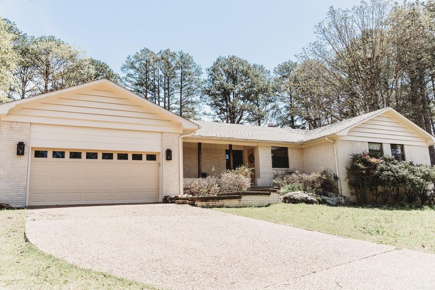 Here's your chance to live on the golf course in Fairfield Bay, Arkansas. This 3BR/2BA home has a BRAND NEW (APRIL 2024) architectural-grade roof, spacious garage, with a safe room, stone fireplace, and sits on an oversized cul-de-sac lot with beautiful trees on the Mountain Ranch 8th tee box. The Kitchen is fitted with high-end appliances and the master bathroom has been enlarged and includes a walk-in shower. This home has been updated with high-end kitchen appliances and newly enlarged master bathroom. This home is in a perfect location to enjoy golfing, ATV trails, and nearby Fairfield Bay marina and all that Greers Ferry Lake has to offer.