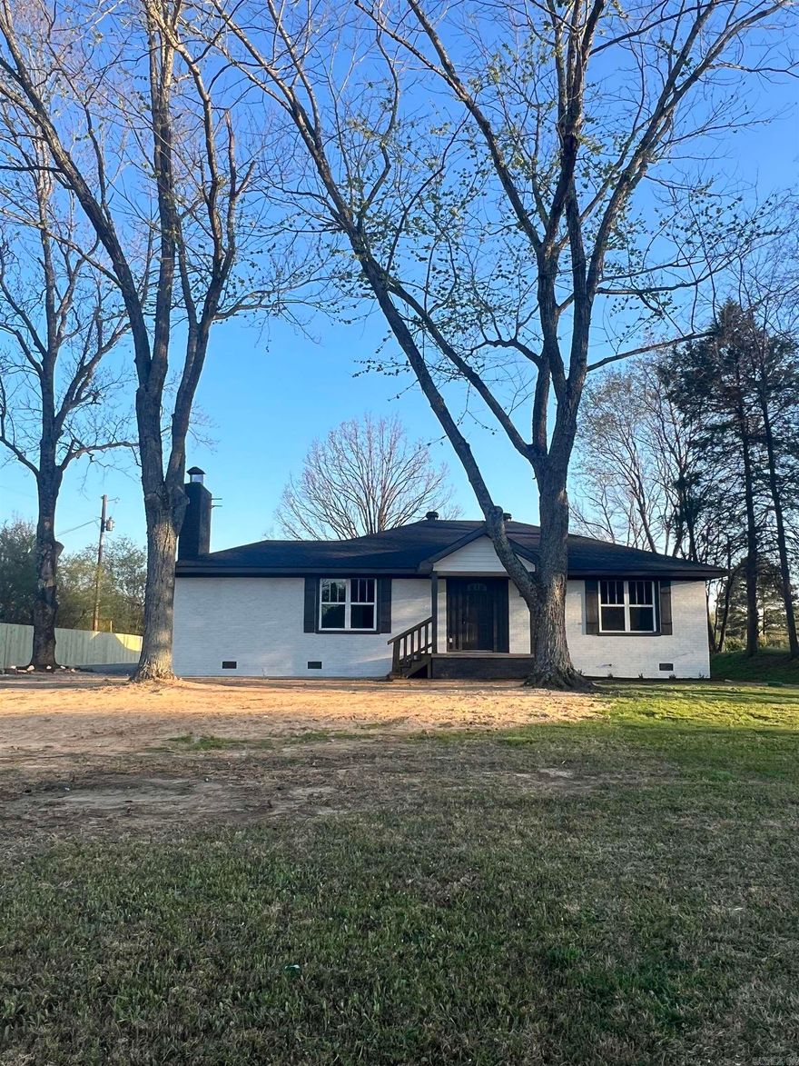 Conveniently located close to town or the interstate, this 3 bedroom 2 bath home has undergone a huge transformation and is move in ready! New sheetrock, roof, windows, plumbing, electrical, cabinets, shower, bathtub, pantry & more! Detached 2 car garage with covered walk and extra storage.