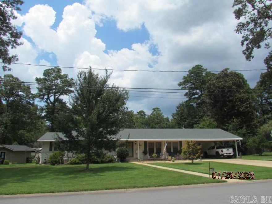 Beautiful custom built home with 2426 Sq Ft featuring a front door entry into the entry hall leading to the  large formal living room and formal dining room that is opened  to the large den with hardwood floors, fireplace with ventless gas logs and large windows with view of fenced backyard. It also is opened to the kitchen with Quartz countertops, pendant lights above island, dishwasher, extra cabinets, desk area,  stove, tile floors, double doors leading to the  144 sq ft covered patio, & easy access to the great laundry room with extra cabinets.  A hall with three storage closets leads to the 3 large bedrooms, 2 remodeled bathrooms with tile floors, marble showers, one walk-in & both Handicap accessible.Natural stone front patio to welcome guest. In the backyard a covered patio, 11X11 Gazebo, out door living area with benches and burn pit, shop, storage building, open garden house for yard tools & Generac Whole Home Generator installed in 2021,7 year warranty. New windows, Central unit 5 ton, 2016, roof 2016. Beautiful refinished hardwood floors are featured in the beautiful home & tile floors in Kitchen and laundry. To know all the amenities of this beautiful home, you must see