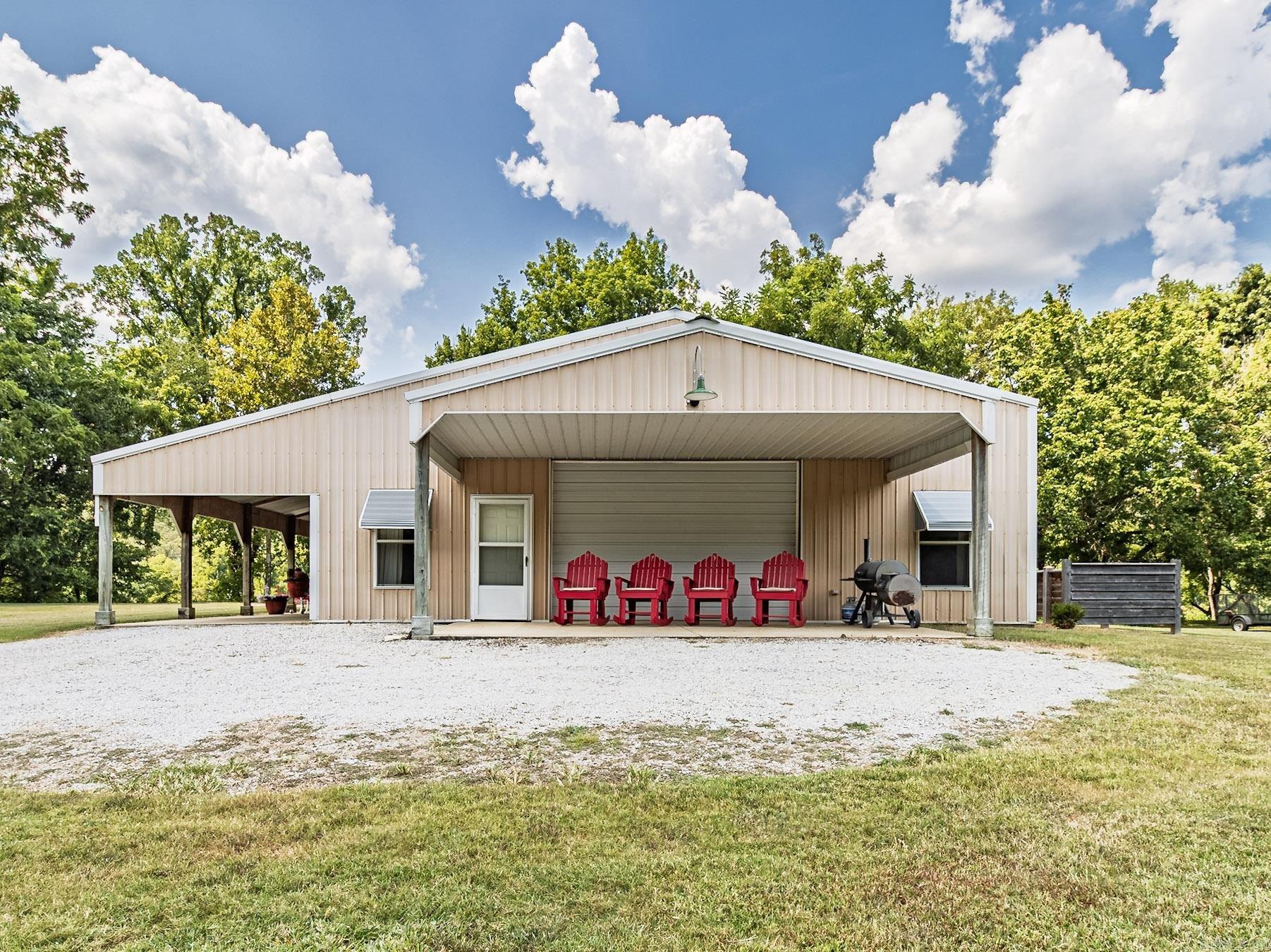 ***PRICE REDUCED***Excellent value with this Beautiful well kept 3 bedroom 2 bath Barndominium sitting right on the banks of the beautiful white river, property consist of a very well manicured 7.87 acres with approximately 460 ft of river frontage.This property checks all the boxes, plenty of garage/shop space for all the toys. Also has additional 24x30 shop with lean-to's on both sides. Most furnishings stay. Property joins national forest which gives access to thousands of acres to explore. 12 minute drive to downtown Norfork, new owner could easily divide to reduce cost. Contact for tour. Expedition Land and Realty Ricky Harris 901-870-7216