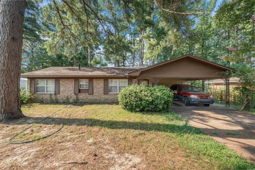 Great Starter OR  Investment  home  add some personal touches and make it your own.  This home is ready for you features eat in  Kitchen, formal living room, three bedrooms and one full bath, large yard, & carport. Schedule a showing today.  (Agents See Remarks).