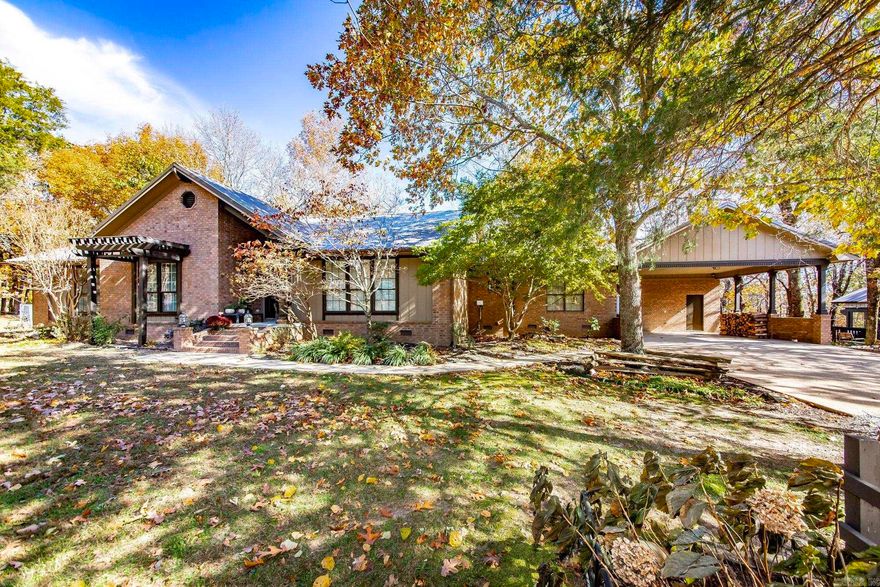 WELCOME to a Truly One-of-a-Kind Mountain Retreat! This cozy custom-built home offers the perfect blend of privacy, comfort & natural beauty. Tucked away on a no-outlet street, just outside of the city limits, the home is beautifully positioned atop a gentle ridge, offering year-round long-range mountain views. Inside, you'll find beautiful craftsmanship throughout w/3 bedrooms & 2.5 full bathrooms, an expansive open-concept living w/ a stately fireplace & open kitchen area that offers quartz countertops, custom cabinetry, & direct access to a sprawling covered back deck—perfect for entertaining or simply soaking in the scenery. The spacious master suite features a private sun room, walk-in shower, an oversized soaker tub , two walk-in closets. Includes a whole house generator, spacious 24x36 workshop, 8x14 storm shelter & a large RV shed. Don’t miss the quaint little tree-house cabin out back. You’ll have plenty of room to roam, garden, relax & enjoy the sights and sounds of nature here. A home office would be ideal considering you have Fiber Optic Internet! Furniture is negotiable. This home has so much to offer. Call me today!