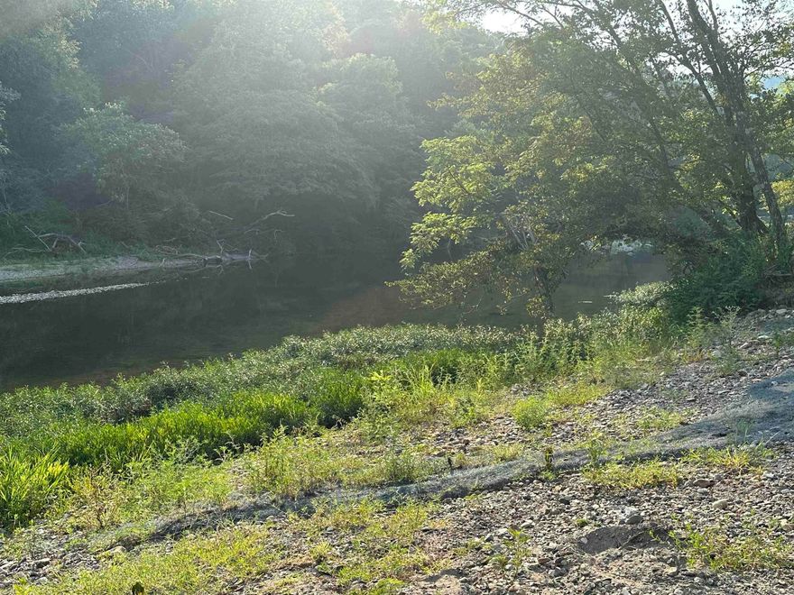 1+/- acres.  Here's your chance to finally own your little slice of the Caddo River life. Utilities are available at the property.