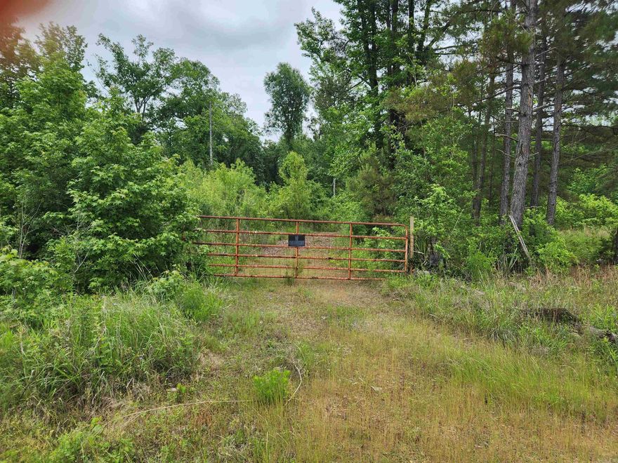 Country acreage for building your new home or moving mobile home on!! Beautiful mature Oak Trees!! Plenty of space and privacy. This property had 3 water meters and electricity on it at one time! There is an old mobile home on property that needs to be torn down or removed.  Don't miss out on this one!! Give us a call today.