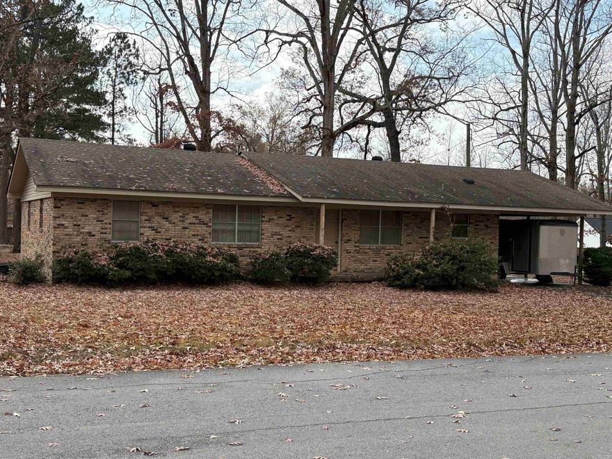 A nice multi colored brown brick home.  Kitchen den combination, formal living room, laundry room.  Single carport with storage room.  Great starter home or investment opportunity.