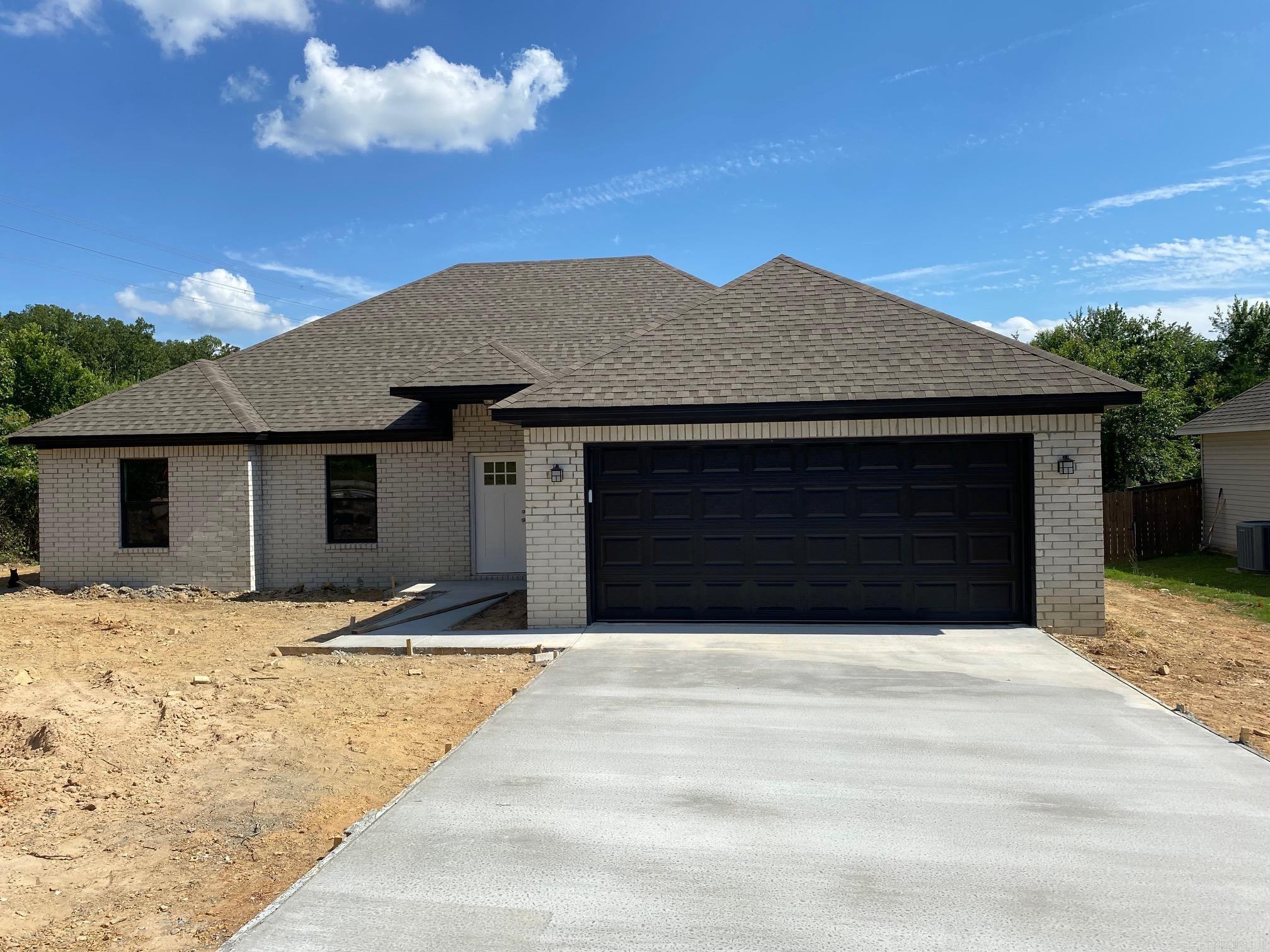 New Construction close to Little Rock Air Force Base (LRAFB) in Cabot AR.  Four Bedroom, two bath, two car garage. Floor plan features open concept, living, dining and kitchen.  Large Laundry room.  Very nice primary suite, double vanities, custom tile shower, soaker tub, large walk in closet.  Three other bedrooms have hall bath.  All floors are luxury vinyl plank.  Beautiful home, call today.