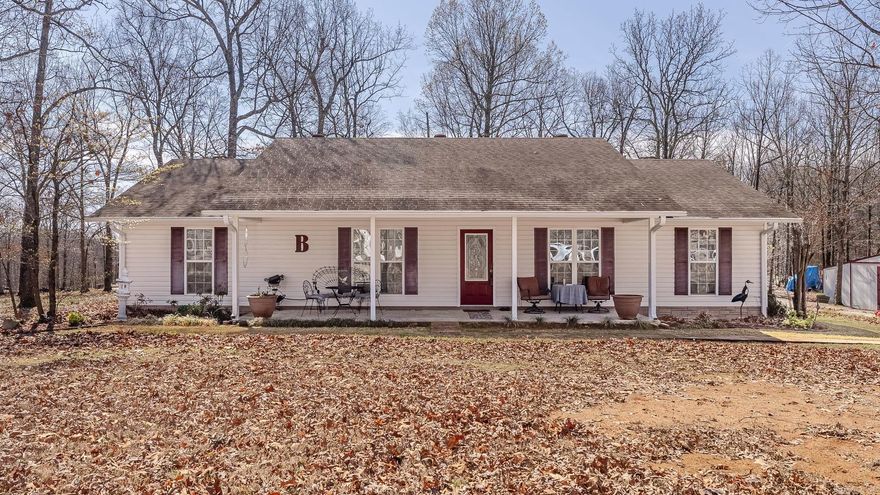 This charming three-bedroom, two-bathroom home nestled on a serene one-acre country setting, offering the perfect blend of comfort, functionality, and modern updates. Adjacent to the living room, you'll find a well-appointed kitchen, boasting an abundance of cabinets and ample workspace, catering to the needs of any culinary enthusiast. An eat-in kitchen area provides a casual dining space, perfect for enjoying meals with family or friends, while a separate dining room area offers a more formal setting for special occasions and entertaining guests. Conveniently situated off the kitchen is a great office space, providing the ideal environment for work or study. The primary bathroom features an updated walk-in shower, adding a touch of luxury to the ensuite bathroom. Outside you have a workshop with electricity to tinker in.