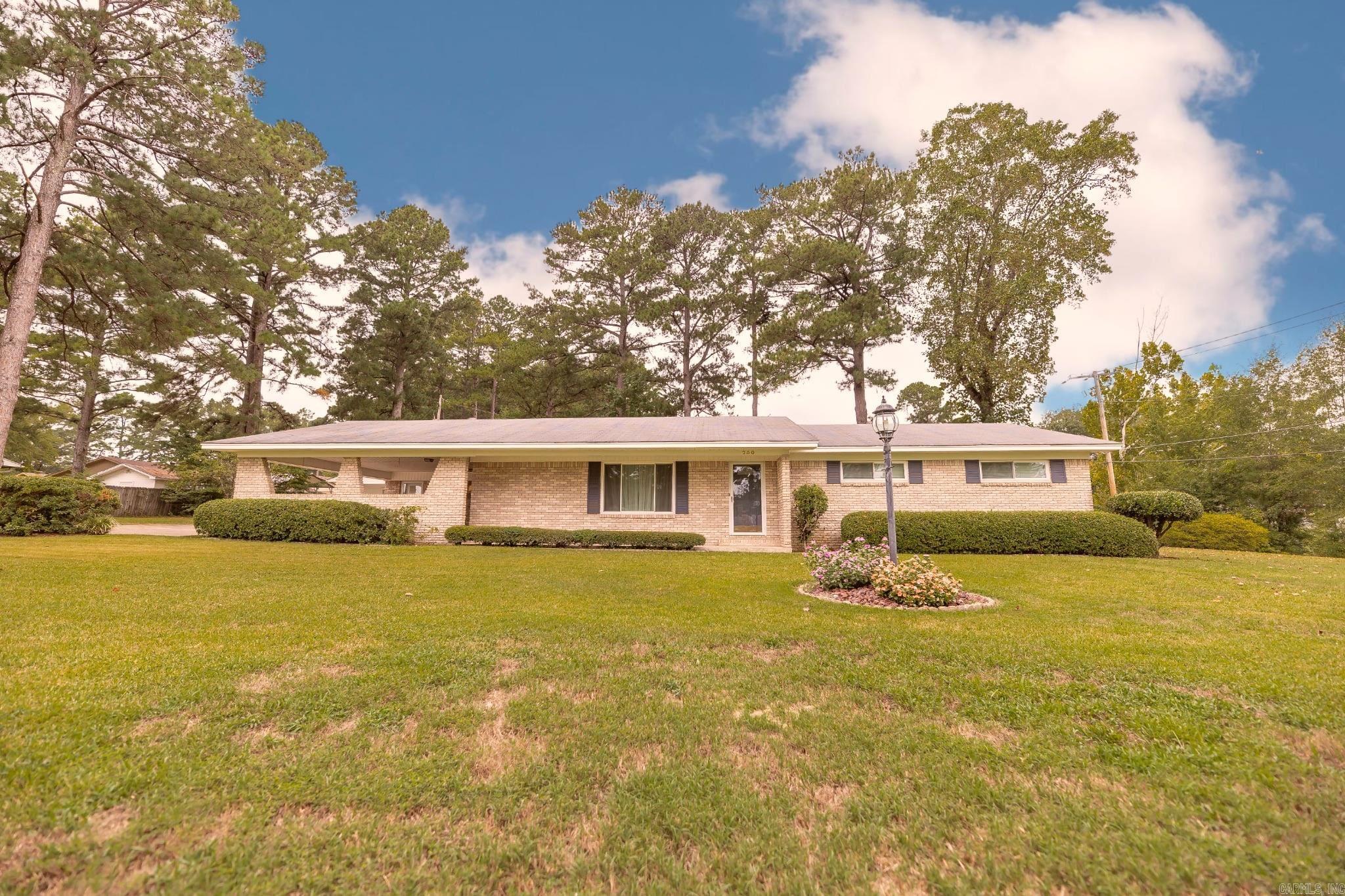 For the first time ever, this lovely brick home is ready for its next chapter. Owned and gently cared for by the same family since it was built, this is more than just a house ā itās a place where memories were made, holidays were celebrated, and lifeās landmarks were savored. Sitting on a spacious corner lot, this home welcomes you with its timeless brick exterior, thoughtful landscaping, and a sense of warmth that you feel the moment you arrive. Inside, you'll find a space thatās been lived in with love ā clean, comfortable, and ready to be made your own. While you may notice the versatile space and key updates to the kitchen, youāll also enjoy the comfort of whatās not easily seen, such masterful construction of 2x6 walls and a brand-new heat & air unit. Out back, the vaulted patio is a peaceful retreat ā perfect for watching the seasons change, hosting friends, or simply enjoying a quiet cup of coffee. And just beyond, a solid cement-slab shop stands ready for weekend projects, hobbies, or extra storage. This home has been cherished for one family ā and now, itās ready to be yours.