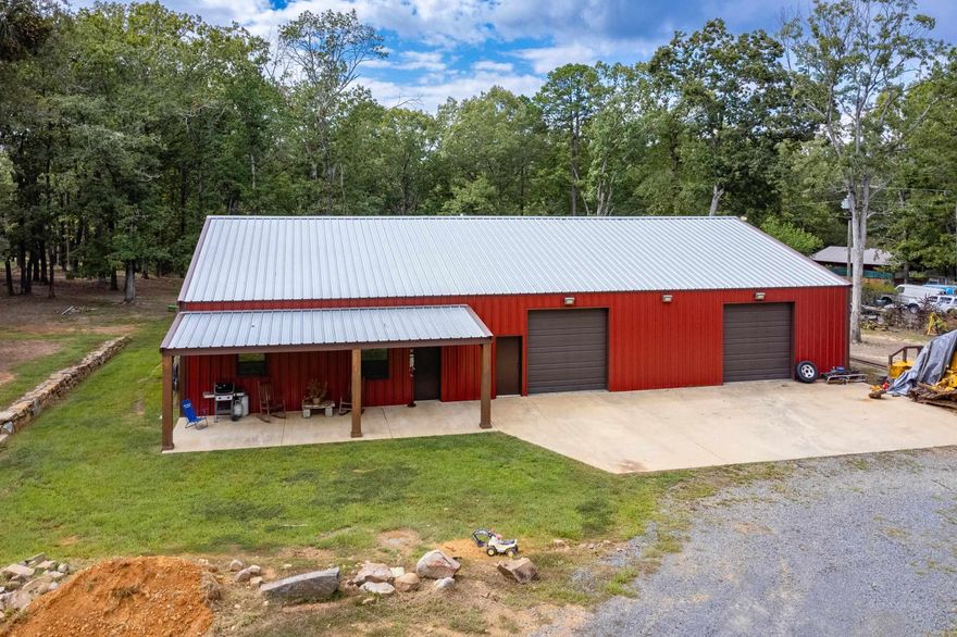 Nestled on 10.86 +/- acres in Perry County just off Highway 113 and Highway 10, this Bigelow property features a spacious 80X50 Barndominium built in 2021 with a charming shiplap wood interior, 20X30 balcony with hidden storage, 30X12 front porch, 80X18 back lean to , and 50X20 shop apron.  The acreage was selectively cleared between 2019-2025, the land offers a mix of mature oak, hickory, and pine trees, a pond, and abundant wildlife for hunting enthusiasts.  Modern conveniences include fiber optic internet, a Wilson cell booster, city water and a new driveway with 40 foot culvert.  Additional highlights include an in ground storm shelter, balcony pre wired for extra bedrooms, and the shop side (approx 2415 sq ft) has plenty of room for parking and the ability to heat in the winter - making this property a rare combination of rural beauty, recreation and modern living. Additional acreage is available to purchase.  Agents - see remarks for additional information.