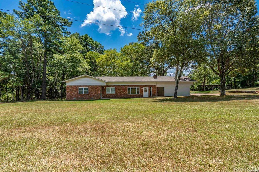 Peaceful Retreat located just minutes from Lake Degray!! Beautifully remodeled this ranch-style home offers the perfect blend of comfort, space, and functionality. Featuring 4 spacious bedrooms and 3 full bathrooms, this home is designed for both relaxed living and entertaining. Step inside to discover an open, airy layout filled with natural light and stylish updates throughout. The cozy living room boasts a charming wood-burning fireplace—ideal for chilly evenings and creating a warm, inviting atmosphere. The master suite is a true retreat, complete with a large sitting area that opens directly onto the backyard deck. A versatile bonus room just off the kitchen offers endless possibilities: home office, fitness area, or a second living space, with its own access to the deck for seamless indoor-outdoor living. Outside, enjoy the freedom and privacy- whether you’re dreaming of a garden, admiring the wildlife, or simply more room to roam. With a spacious back deck and completely updated interiors, this turnkey home is ready to welcome you. Approximate 3 minute drive to Lake Degray's, Shouse Ford boat ramp.