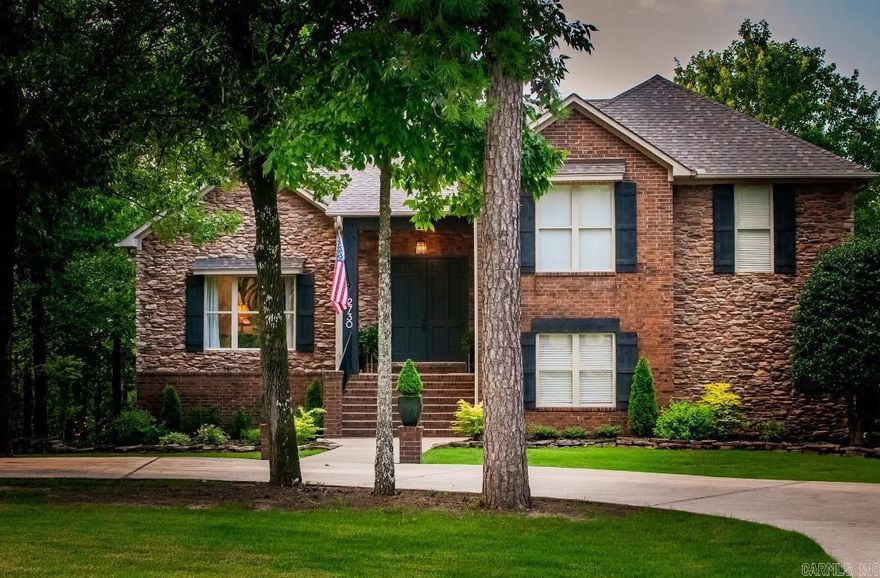 This stunning home sits on 3.89 tree-covered acres with a park-like setting and breathtaking views. This property has the perfect blend of Luxury, Comfort, and Outdoor living. Step inside to a spacious living room with a gas fireplace and beamed ceiling. A chef's Dream Kitchen features GE Monogram, six-burner range w/grill, double ovens, Bosch dishwasher, & R/O water filter. The walk-out basement features a wet bar, media room, and game/exercise room. The master suite has its own deck, soaking tub, walk-in closet and built-in wall safe. There are an abundance of shelves in the library/reading room as well as a dedicated office with built-ins. Many other features include a camp-style fire pit, three separate decks, hot tub, tankless water heater, wired for emergency generator, wired for electric car charge, spacious laundry room, three-car side-entry garage with an abundance of cabinets for storage. This home has it all!!!