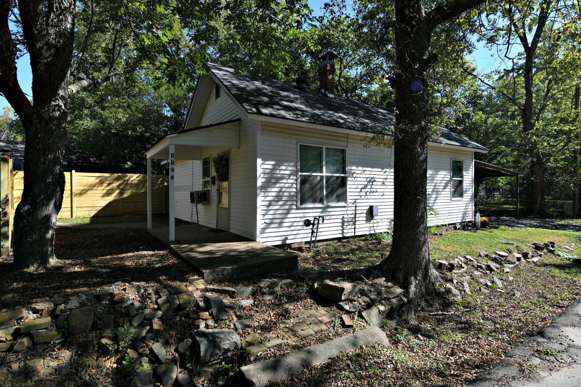 This charming 2-bedroom, 1-bath home offers cozy living with 804 square feet of beautifully remodeled space. Located in the heart of town, this home boasts modern upgrades throughout, including brand-new appliances and an on-demand water heater for added convenience. The kitchen features ample cabinet space, making it both functional and stylish. Enjoy peace of mind with newer plumbing, wiring, and windows, ensuring this home is as efficient as it is adorable. This home combines comfort with modern amenities in a fantastic location!