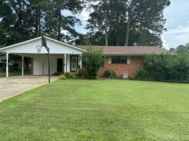 This 3 bed/1.5 bath ranch style home in the Raquet Club area offers all new doors, new floors, new paint throughout, new dishwasher, 1 yr old refrigerator, new kitchen sink, new vent a hood, new cover on deck, sprinkler system in front yard, hot tub remains, and red shop is equipped with electricity. Storage bldg, hot house, and large lot in back can be purchased for $59,500 and buyer will have first choice.