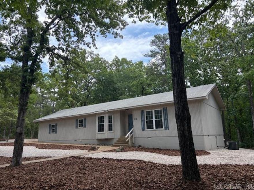 Newly remodeled and renovated charmer in a quiet, established neighborhood.  This is the perfect home for an investor or singles or empty nesters who want to take advantage of the natural beauty, serenity and safety offered by Hot Springs Village. With a fenced yard, this is perfect for your four legged friend, as well.  Updated floors throughout, brand new appliances and a lot of storage for a smaller home.
