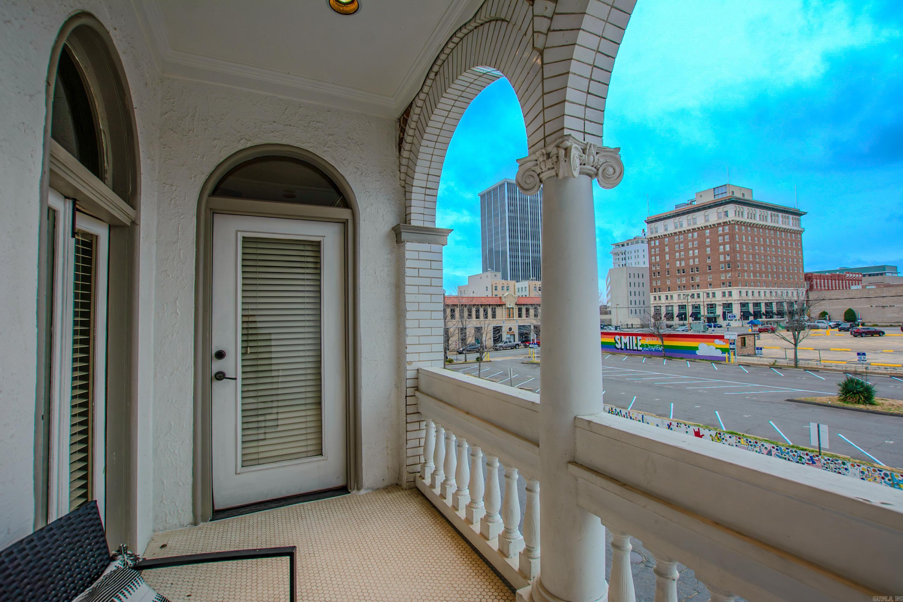 Welcome to a beautiful blend of historic, architectural design, fabulous contemporary decor and a loft-style living reminiscent of New Orleans French Quarter. This one bedroom, one bath apartment with outdoor patio area is comfortable, spacious and conveniently located within walking distance of the River Market, park and Arkansas River. Here's a great opportunity to live in downtown Little Rock and have a fully furnished apartment - and I emphasize FULLY furnished! This is unit not only includes furniture, TVs and appliances, the kitchen is fully equipped with a Keurig, dishes, glassware, pots, pans cookware and utensils. Bed linens, and bath towels are also included. Water, trash pickup and a designed, paid parking space are also included. Bring your clothes and toothbrush and you're set! Lease is required. No pets. Call today to schedule a tour. Advance appointment required. *Agents See Remarks*