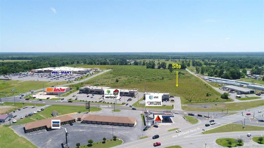 Great location!  9.0 AC at corner of Dewitt Henry/Hwy 367 & W. Center St. Dual access from both Dewitt Henry & Cornerstone Dr (side street to Walmart Supercenter) provides maximum visibility & superior ingress/egress. Excellent location for hospitality, mini-storage, or any large general commercial use.  Property is mostly level & cleared w/city utilities.  Zoned C-2.  Additional acreage available.  Seller will re-divide according to Buyers needs. Some use restrictions apply. Call for more details!