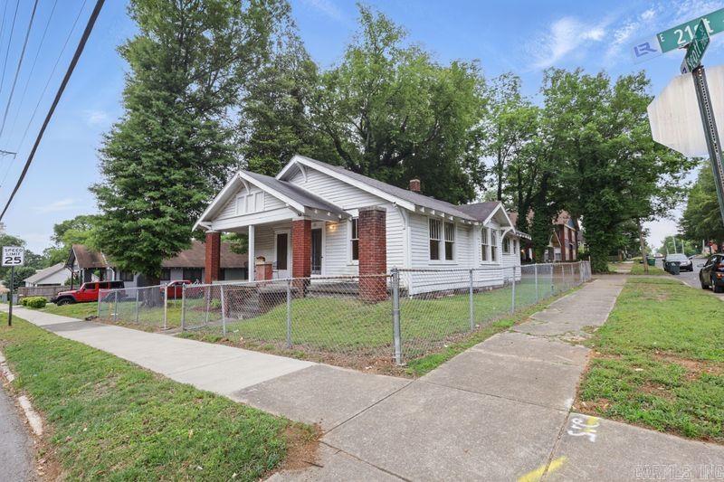 201 E 21st is a charming Craftsman style home on a corner lot in one of Little Rock's most walkable neighborhoods. Inside, you'll find original hardwood floors, plenty of natural light, wonderful built-ins in the dining area, and two bedrooms - plus a bonus room that would make a great office, hobby space, or cozy third bedroom. Detached garage and partially fenced yard, with ample off-street parking. Just two blocks from Pettaway Square and a 10 minute walk to everything SOMA has to offer.