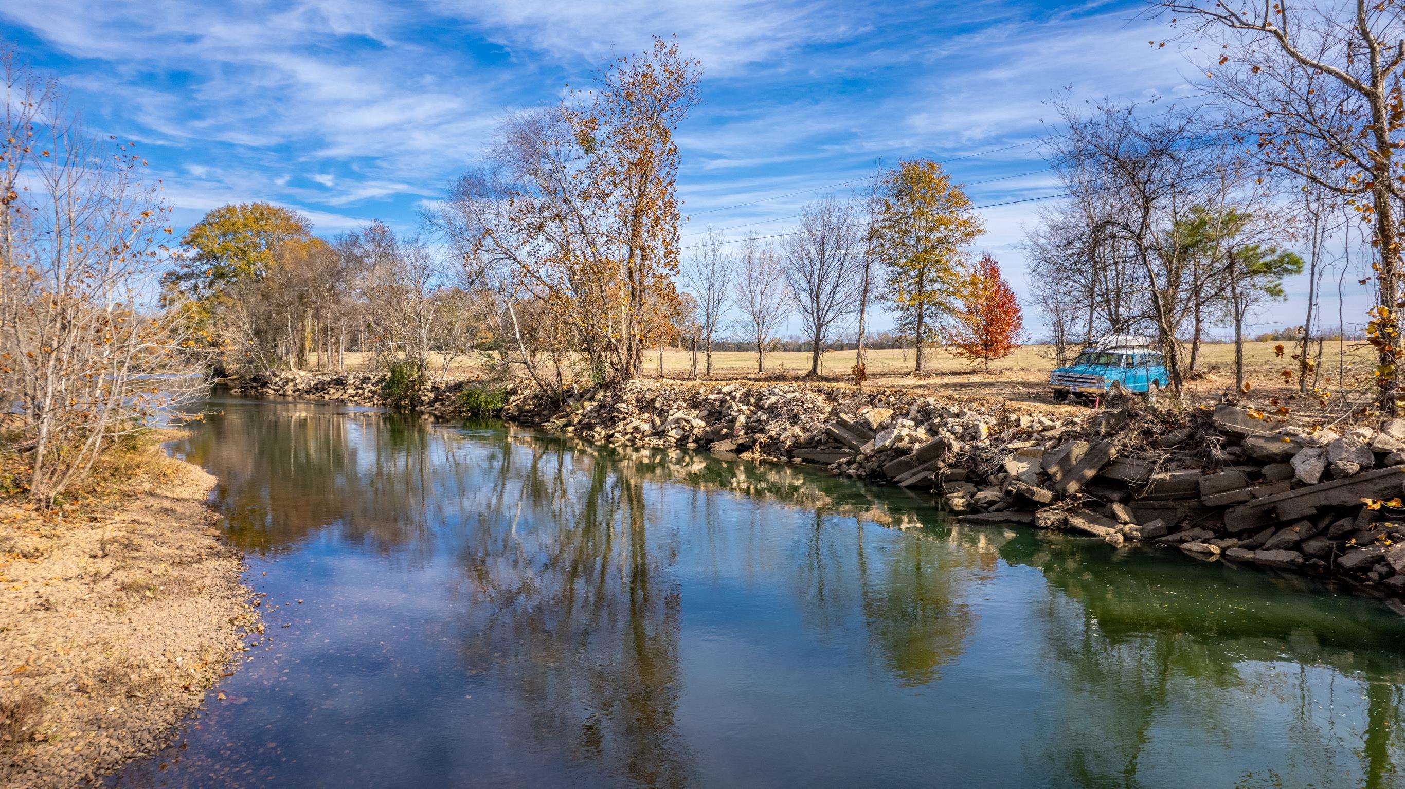 Lot 7 in Caddo Paddock Subdivision has deeded walking access to the Caddo River. Paved county road access along Old Military Road, municipal water, permitted septic, underground electricity, fiber internet, and deed restrictions serve to protect value as well as enjoyment of the property. Restaurants, float outfitters, and I-30 are less than 1 mile away with Arkadelphia being only 5 miles south. The property has a unique history and is ideal for VRBO investment near DeGray Lake.