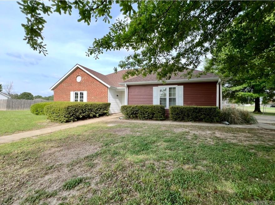 This charming and well-kept home packs comfort, function, and outdoor beauty into an inviting 1,199 sq. ft. layout! Featuring 2 generously sized bedrooms and 1.5 baths, you’ll love the spacious feel throughout. The two-car garage offers plenty of storage and convenience, while the screened-in porch creates the perfect spot to relax and unwind year-round. Step outside to a gorgeous corner lot filled with mature shade trees, a lovely arbor, and not one—but two—storage sheds for all your tools and hobbies. With ample parking and major appliances—including the washer, dryer, and refrigerator—already included, this home is move-in ready and full of value. A rare find with both charm and practicality—don’t miss your chance to make it yours!
