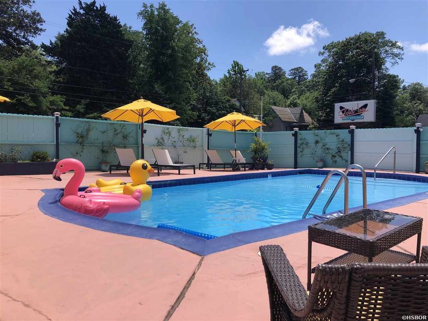 Welcome to the Gold Inn Hot Springs! Situated just north of downtown, this 17 room/suite motor court was constructed in the 1920s and has been extensively remodeled over the past several years. Wildly popular with vacationers wanting to be close to downtown and the Northwoods Trail! The property also features a private pool, manager's quarters, laundry room, covered parking, office, kitchen, new electrical/plumbing & new mini-splits in the rooms. This is a turnkey business with great nightly rental history!