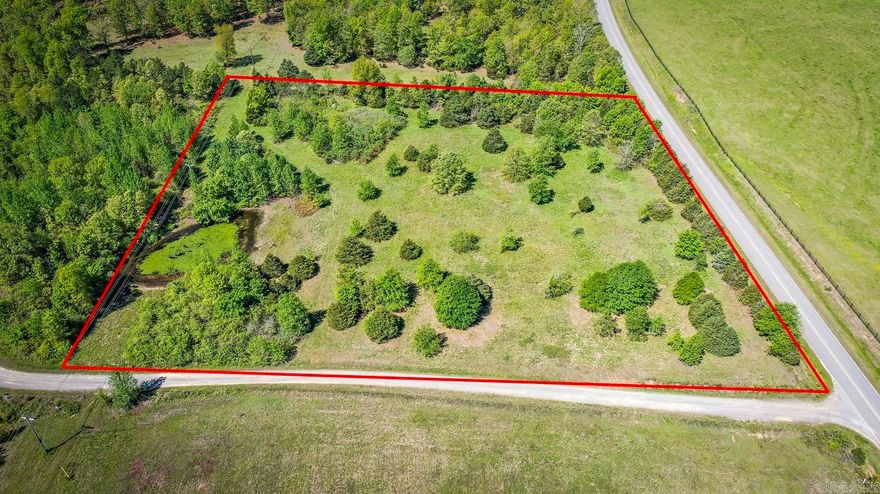 Gorgeous country setting with beautiful mountain views around you. This 4.8 acre tract of land features : majority of the land is pasture with some trees  left in all the right places, pond,  highway frontage on Scotland  Formosa Road or make your  driveway on Buena Vista Road,  power, water, and fiber internet  is available, and all you will need  is a septic system. This really is  a pretty place to build your  home and have horses or  livestock. Restrictions include :  Minimum sqaure footage is  1,250 sq,ft, double wide mobiles  on permanent foundations  allowed and must not be older  than 5 years, and horses and  livestock is allowed. Mineral  rights do not convey. Close to  Greers Ferry Lake at Choctaw,  Buffalo River, Archey Creek &  Middle Fork and South Fork  Little Red River, and Gulf  Mountain WMA just 10 minutes  away (horseback riding, side by  side riding, and hiking). Call the listing agent for more information and to schedule a  showing.