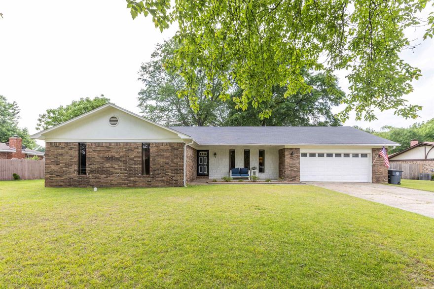 CUTE & STYLISH! Style abounds w/this home!  Updated paint, trim, & flooring throughout the home.  Entering the home you are greeted by a fantastic open floor plan w/Living Room, Dining Room, & Kitchen space defining open concept!  The Living Room is centrally located w/Bedrooms and Baths off on the left hand side of the home and Laundry and Garage off on the right hand side of the home.  This is not a laundry closet or tiny laundry room, there is plenty of space in this large laundry room w/laundry sink too.  Plus, a new HVAC added in 2019.  The home is ideally situated on the center of the lot providing for a nicely sized front and rear yard.  The rear yard boasts nice trees for shade during the Spring & Summer allowing for nice family gatherings in the fully fenced backyard.  Privacy fence added in 2021. Agents See Remarks.