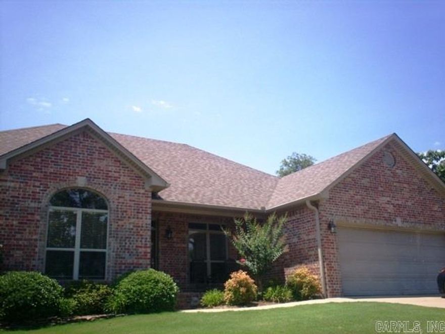 4 Bedrooms, 2.5 bath brick home with 361 Sq. ft. bonus room. Floored attic. Covered screened porch opens to deck that over looks fenced back yard with extra landscaping, 12x16 shop with electricity , insulated, and two entrances. Kitchen has oak cabinets, island, breakfast bar. Laundry room with sink. Zoned heat & air. Home wired for high speed internet & cable, crown molding, ceiling fans, and gas fireplace.