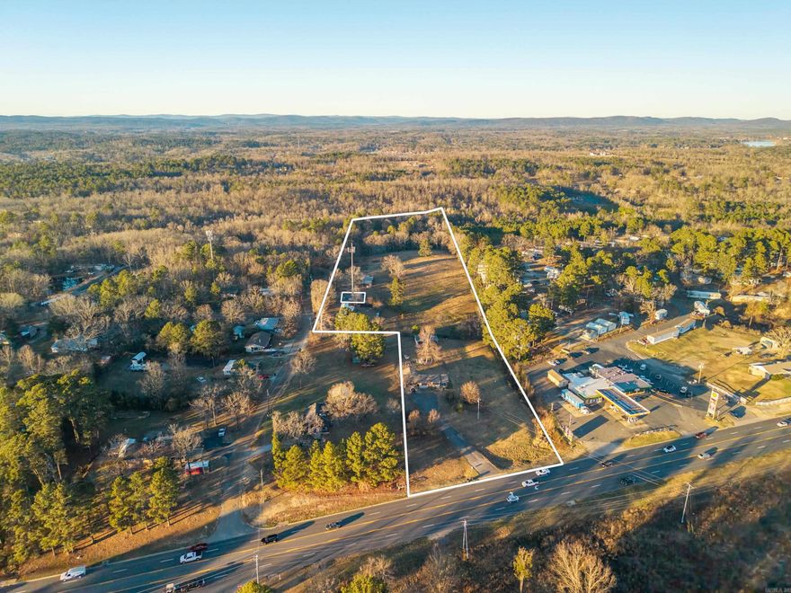ALERT INVESTORS! Your perfect development awaits! With around 12 acres of land,  Traffic count is exceptionally high. Easy access and frontage on the 5 lane highway with center turning lane of Airport Rd, with additional access and frontage on N Rogers Rd makes this property accessible for anything! All utilities available