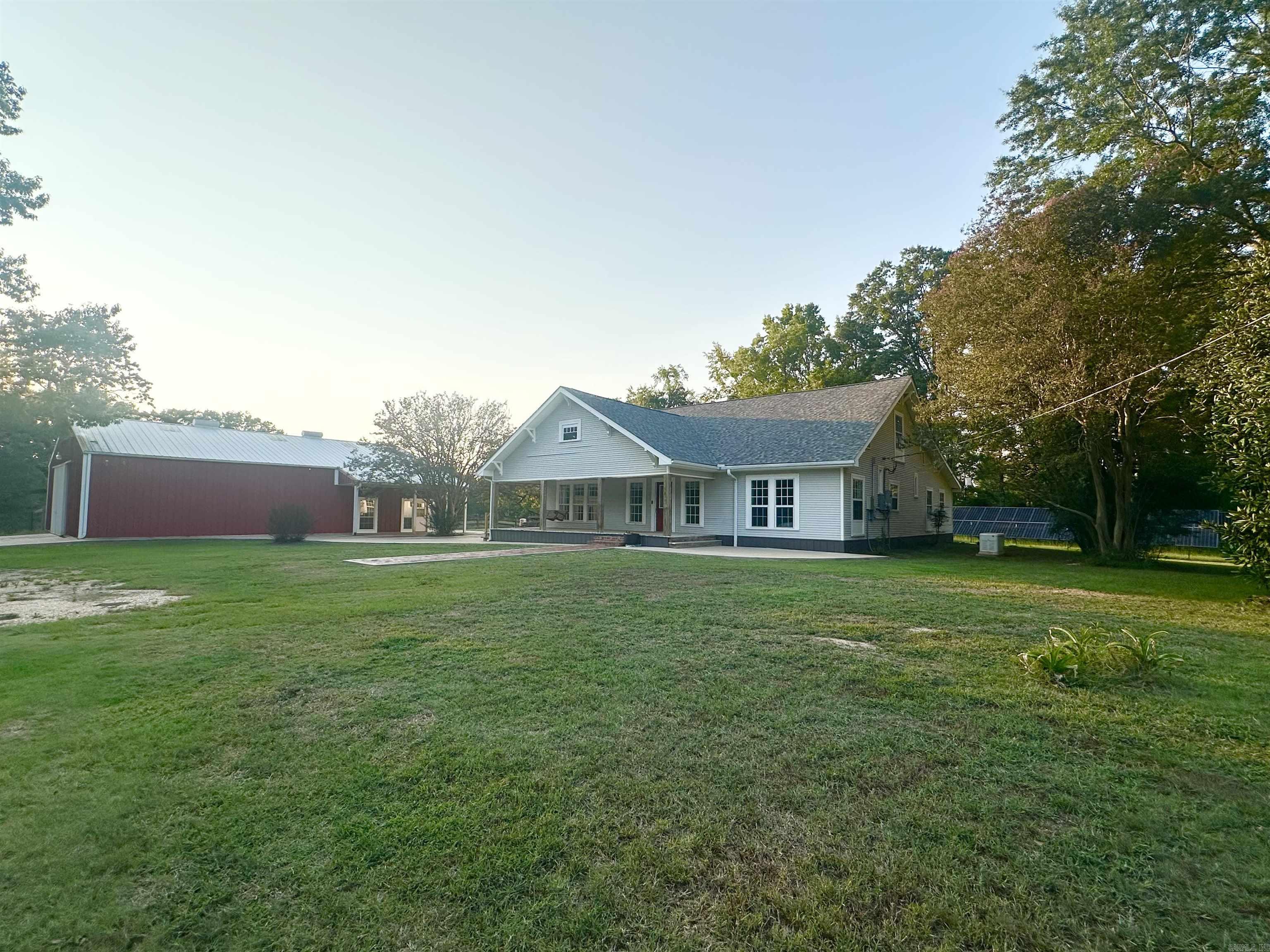WELCOME HOME! This Beautiful Completely Remodeled Farm Home Nestled In The Country Is A Must See!! Truly A Homesteader's DREAM With A Shop ANY Man Could Appreciate! Home Features A Whole Home Generator (Runs House & Shop), Solar Panels (Contract Paid), Live-In Quarters Or The PERFECT Place For A Family Looking To Homeschool! Home Features 4 Bedrooms With Each Its Own Private Bathroom, Home Is Energy Efficient, Updated Windows, New Lighting, All NEW Plumbing, Completely Renovated, Quartz Countertops, A BEAUTIFUL Kitchen, Elegant Dining Room, Sun Room, All New Windows, 2 Separate Washer & Dryer Hookups In Home (Shop Has Its Own), New Flooring, And SO MANY MORE NEW FEATURES! Shop Is Completely Insulated With 2 HUGE Bay Doors On Each Side, Property Is PERFECT For Growing Your Own Garden, Even Has A Water Well If Needed! Everything About This Property Has Been PHENOMENALLY Taken Care Of! 1,000 Gallon Propane Tank, Shop Is 50x60! Schedule A Showing Today!