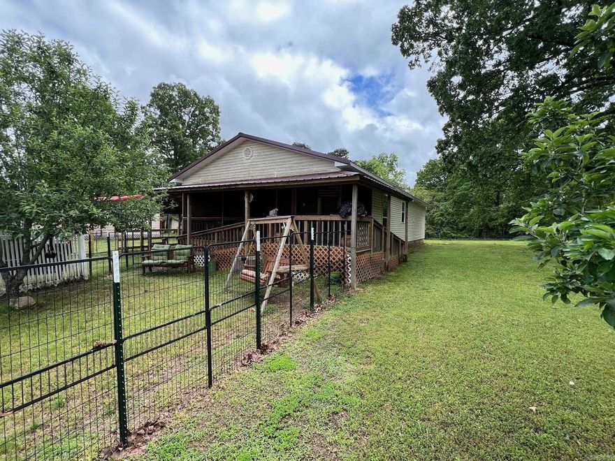 Nice two bedroom two bath home built in 2021. Nice front screened in porch and carport. Laminate floors throughout. Both bathrooms have walk in showers. Washer, dryer and kitchen fridge convey. Home has a tankless hot water system installed. There is a small fenced in yard for your pet. This is a nice clean house that is ready for a new owner