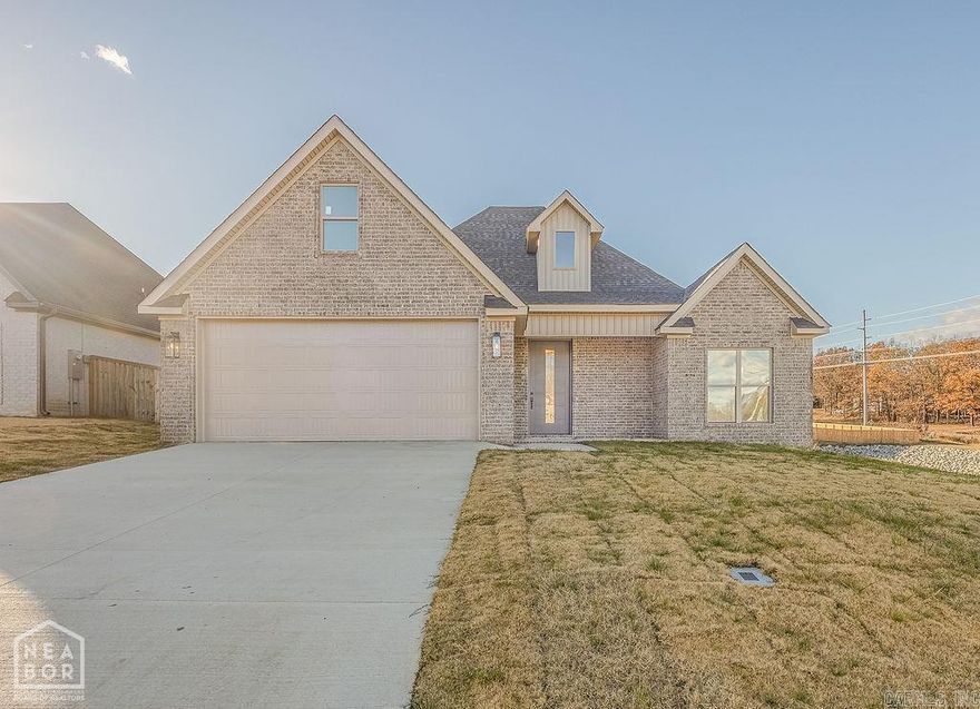 Welcome to 3421 Valencia located in the beautiful Sage Meadows Subdivision. This new construction home is located in the sought after Brookland School District. Main level features luxury vinyl flooring with a beautiful gas log fireplace. Living area is open to formal dining room with is perfect for entertaining. Kitchen has grey cabinetry, black stainless appliances, granite countertops, pantry, tiled backsplash, and a pantry. The primary suite has his/her sinks, spacious tiled shower, and a soaker tub. 2 bedrooms located opposite of primary share a hall bath. Upstairs features a bonus room/4th bedroom. Call today before this one is GONE!