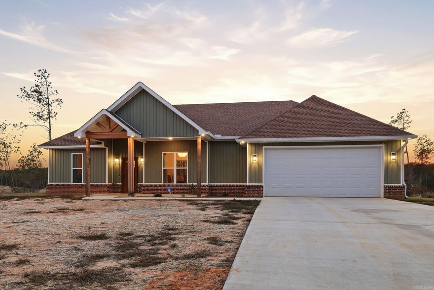 Discover modern country living at its finest in this brand-new, never-occupied 3-bedroom, 2-bath home on 3 serene acres just outside of Benton. Spanning 1,861 sq. ft., this thoughtfully designed residence blends contemporary comfort with rustic charm. Step inside to an open-concept layout filled with natural light, featuring stylish finishes, a spacious kitchen with premium fixtures, and a cozy living area perfect for gatherings. The primary suite offers a peaceful retreat with a luxurious en suite bath. Outside, enjoy panoramic countryside views, plenty of room for outdoor living, and the tranquility of wide-open space—all just minutes from the conveniences of town. Whether you’re seeking a quiet escape or a place to grow, this pristine new home offers the best of both worlds.    **Agents See Remarks**