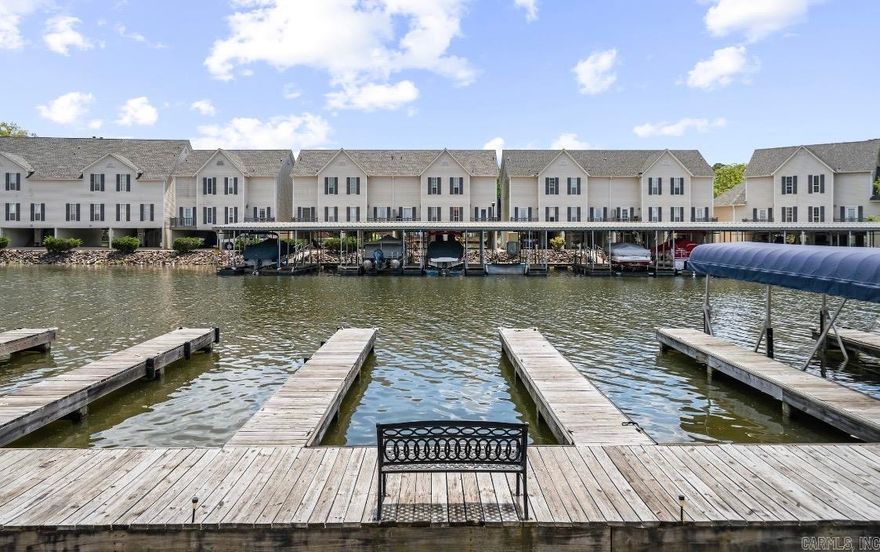 Lakefront Condo on Lake Hamilton – Boat Slip Included! Wake up to Lake Hamilton water views in this 3-bedroom, 2-bath first-floor condo! Perfectly positioned for easy access, this walk-out unit lets you step right outside to your very own boat slip—ideal for lake living at its finest.  Property Highlights: 3 spacious bedrooms & 2 full bathrooms Furnished First-floor unit with direct walk-out access to the lake Private boat slip included  Lake views from your living space  Community Amenities at Clearwater Cove: Gated community for added privacy & security Boardwalk along the water Swimming pool Boat ramp conveniently located just outside the gate  Great Investment Opportunity: Minimum 30-day rental policy—ideal for steady income potential Perfect as a full-time residence, weekend retreat, or income-producing property  Whether you're looking for a peaceful place to call home or a relaxing lakeside getaway, this condo offers the best of both worlds.  Don’t miss your chance to own a slice of Lake Hamilton paradise—schedule your showing today!