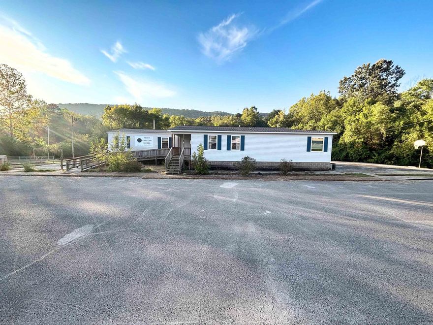 This building has plenty of space and outdoor area for your business needs! New roof in 2024. 4 rooms with 3 bathrooms and a kitchen, sellers believe the approximate square footage to be 2200. agents see remarks.. Year built is unknown
