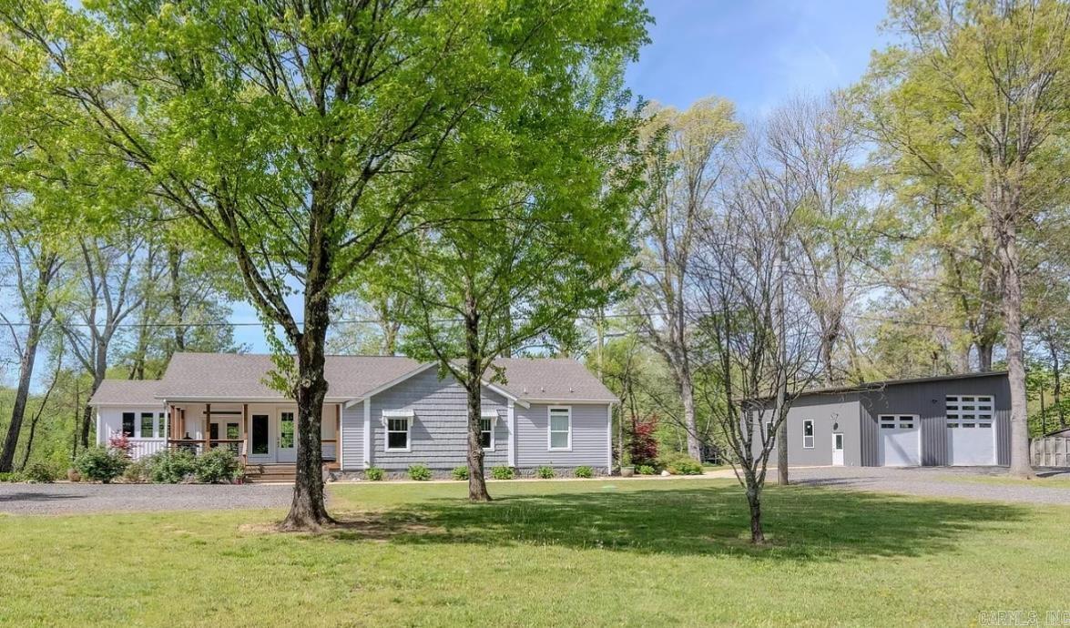 NOTHING like it on the Little Red River. Beautiful, fully furnished home on three full-sized riverfront lots. 300 feet of riverfront on some of the most productive trout waters in North America. This custom home is extremely well constructed with all the comforts. 2x6 walls, Bosch Premium Inverter HVAC, 18 Seer with dehumidifier and more. Outside youāll enjoy covered decks, porches and mature landscaping surrounded by towering trees. And there is still more than enough room to add additional homes or outbuildings if desired. The newer XL dock with lift for 20+ foot trout boat is covered and perfect for entertaining on the water. Thereās also plenty of room for your kayaks and paddle boards. 36x36' (1296 sf) shop with one 12x12 door and one 12x14 door, LED lighting, 50 amp wiring for RV, independent septic with dedicated driveway.Ā Ā Minutes from Marinas and boat launch on spectacular Greers Ferry Lake, shopping and services in Heber Springs.Ā Ā ADDITIONALLY, 8.04 timbered acres immediately across Riverbend Road may be purchased for privacy and/or hunting.Ā Ā See MLS 25024798, Northwest corner of Riverbend and Mudcat Roads. AGENTS SEE REMARKS!