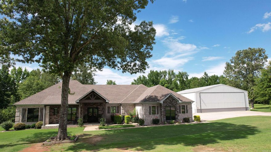 Wish to own a home w/Aircraft Hangar w/ access to a runway right across the road? This custom built 2018 hm offers the airpark lifestyle along w/custom elegances of the home interior PLUS the bonus approx 700 sq ft heat/cool amazing in-law quarters suite off the rear of the hangar too, that is a fully standalone apartment! Entering the Hm thru the double french doors one is greeted by an open foyer w/the centrally located living room & stone fireplace ahead w/accented wood beam trims! The spacious open kitchen w/breakfast bar & dining space & pantry is just off the living room, perfectly designed for entertainment. Stainless steel higher end appliances & solid wood cabinetry adorn the kitchen space. Plus, the office (4th bedroom) is just off the living rm & front of the home. The large master suite w/his & her vanity's in the bathroom, a nicely positioned soaker tub, custom shower, & more is split to its own side of the hm! Jumping to the opposite side of the hm is the guest bed & bathrooms as well as the laundry & large safe room! Not enough words allowed to describe this place! Oh, do not forget about the gas generator for the entire home! IMPORTANT - SEE AGENT & SHOWING REMARKS.