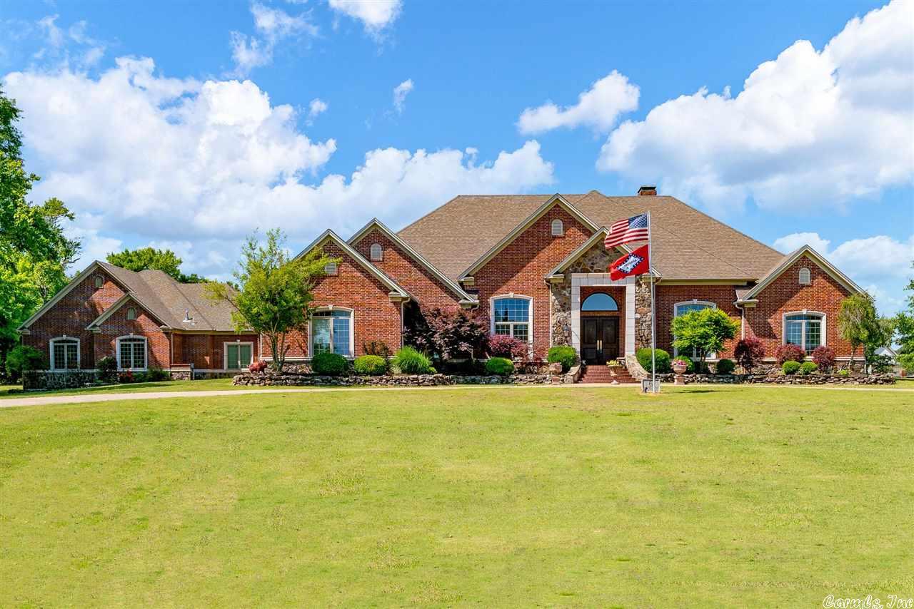 Beautiful home on 2.88 acres in a gated subdivision. 5 bedrooms with in-law quarters that offer two additional bedrooms. Shop, walk-in closets, granite countertops, and a beautiful pool. The liner was changed last year. The subdivision has private access to both Dave Ward Drive and Prince Street. Close to shopping, dining, and offering easy commutes around Conway and Central Arkansas, this home is as conveniently located as it is beautifully designed.