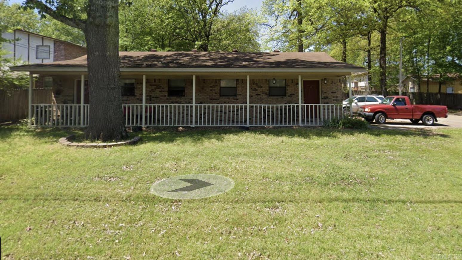 Property purchased with adjacent duplex at 103 N Woodview.