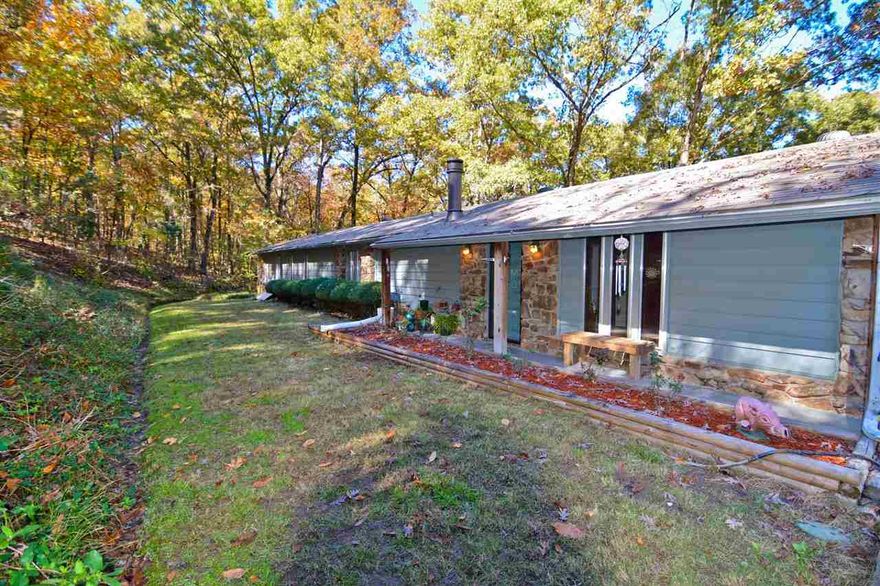 Enjoy the country life with the convenience of living in the city of Little Rock.  This Beautiful 3 bed 2 bath on 5.87 acres has newly Remodeled bathrooms,  Fresh Paint, and spacious bedrooms.  New roof in 2012 and AC unit in 2014.  This home comes with hot tub and pellet fireplace.  2 car garage with plenty of outside storage.  Located only 8 minutes away from Promenade Shopping Center in West Little Rock.  Do not pass on this great opportunity.