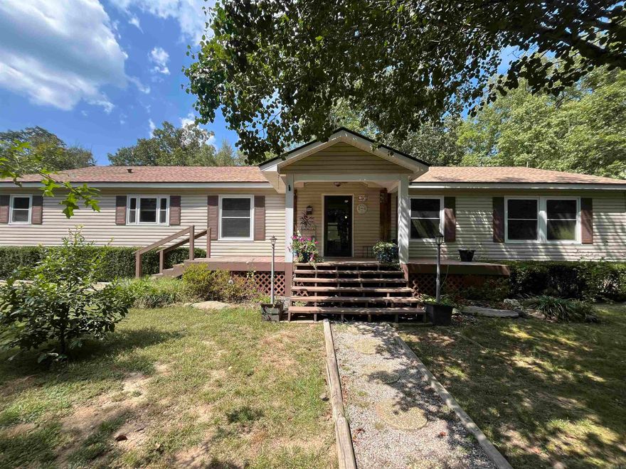 Well maintained 3 bedroom 2 bathroom on almost 3 acres! Two large outbuildings with electric to store all your toys! Sit on the back deck that over looks a creek and watch the wildlife. Right off the new extension of the bypass for quick access to all the amenities Hot Springs has to offer!