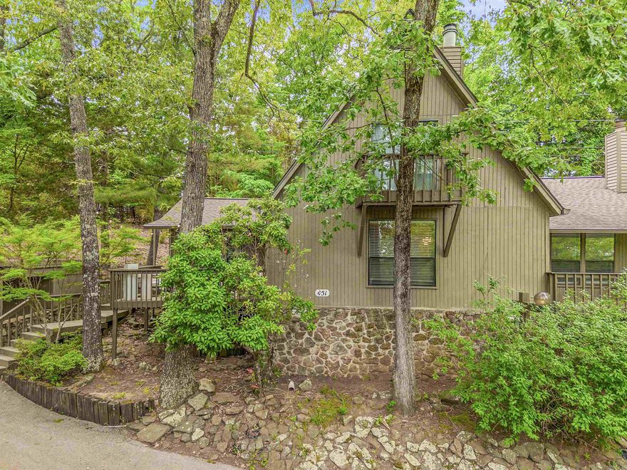 FULLY FURNISHED & STUNNING! This INCREDIBLE Condo, Just a two minute walk from the Red Apple Inn, and a 2 minute drive to Eden Isle Marina at Greers Ferry Lake, is just truly perfect! Alongside having 3 bedrooms and 2 bathrooms, this home also features 2 bonus spaces off the primary suite. GREAT for extra bunkrooms, a home office, or even a sun room! Primary bathroom has a wonderful updated walk-in shower! Sleeping 12 people comfortably, this condo has PLENTY of space for all to join in on! Updated fixtures & paint throughout as well! ! Also featuring a wonderful Carport with storage attached as well and extra parking to the side! The large front porch is very welcoming for some nice relaxation and even grilling! BEAUTIFULLY furnished by an interior designer, this space has it all! Newer HVAC! Come take a look at this one today and call it HOME! SEE AGENT REMARKS!