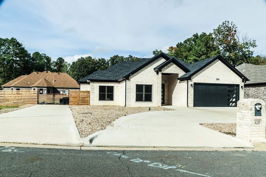 THE BUILDER’S PERSONAL HOME: Completed in 2022 and still in brand-new condition, this stunning one-story 4 bedroom, 3.5 bath, 2,210 sq ft custom home sits on one of the largest lots in the entire neighborhood, offering space, privacy, and unmatched value. Designed and built by the subdivision’s original builder, this home features premium materials, showcase-level craftsmanship, and a layout ideal for entertaining, families, or anyone who wants extra room for recreational vehicles, storage, or large gatherings. PROPERTY HIGHLIGHTS • DOUBLE LOT — rare over sized homesite. Twice the size of neighboring lots with endless possibilities. Concrete driveway + extended parking + double gate for: Boat, Trailer, Work truck, Storage container, RV, Large gatherings / events. Modern Luxury | High-End Materials, Tall ceilings in entry, kitchen, den & living areas, Large-format tile flooring + luxury vinyl in selected areas, High-gloss modern custom kitchen cabinets, Manufactured custom master closet system, Open concept plan designed for hosting & entertaining, Brick & stone, Washer & dryer included, Refrigerator included, Security cameras installed, Painted garage floor, Fully fenced backyard.