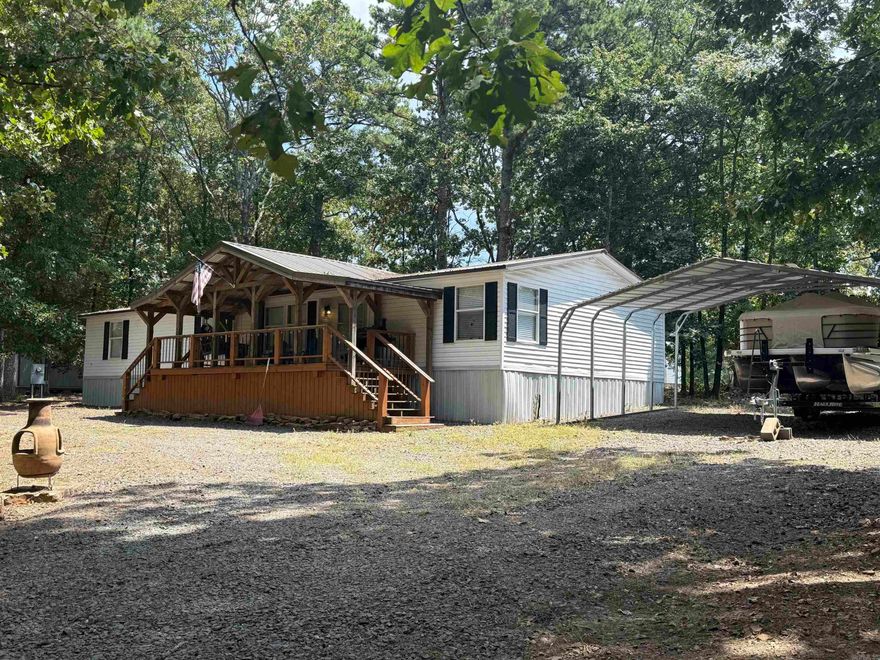 Charming FULLY FURNISHED mobile home on one acre - only minutes from Greers Ferry Lake!  This beautiful mobile home sits on a spacious one acre lot just 4 miles from Hill Creek Marina.  Whether you're looking for a weekend getaway, full-time residence, or an investment property, this one checks all the boxes!  From furniture to decor, everything stays!  Just bring your clothes! Outside, enjoy the convenience of a 12x16 storage shed and a 20x25 detached carport for vehicles or boat storage.  Full RV hookup adds even more versatility for guests.   Don't miss this opportunity to own a lake retreat with space, convenience and value.  Schedule your private showing today!