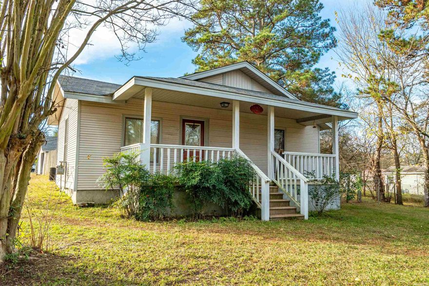 This beautifully updated three-bedroom, one-bath home is in great condition and move-in ready. Enjoy a spacious kitchen and bath, along with a charming front porch perfect for morning coffee. The private backyard offers an ideal setting for gatherings, relaxing evenings, and even a fire pit! A standalone carport provides additional storage or a workspace. A wonderful blend of comfort, updates and outdoor living.