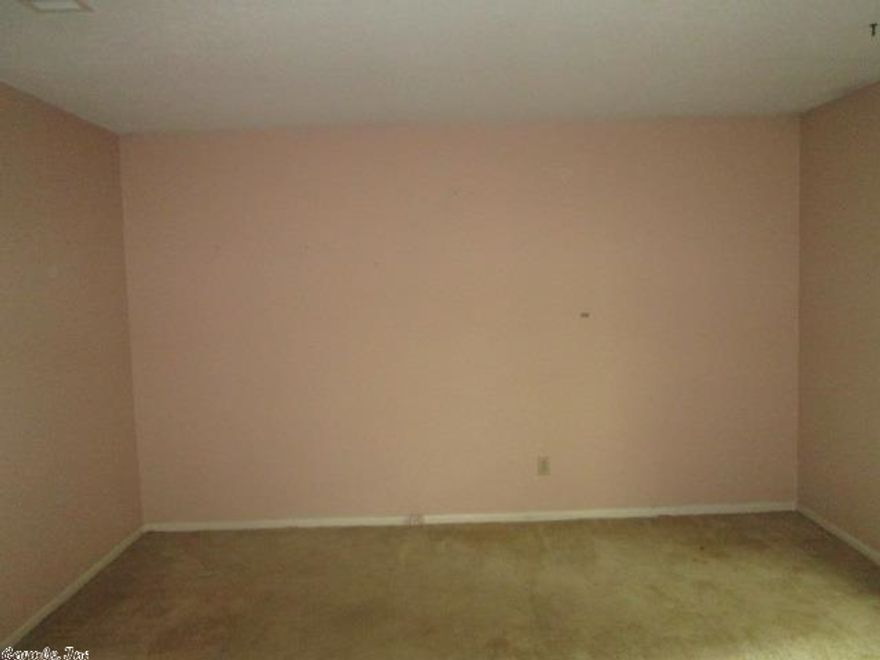 Nice brick home with three bedrooms and two baths. Large living room and den with corner fireplace. Kitchen/dining room combination. Cover porch. Property is sold "AS IS" and is subject to HUD Guidelines 24 CFR 206.125.