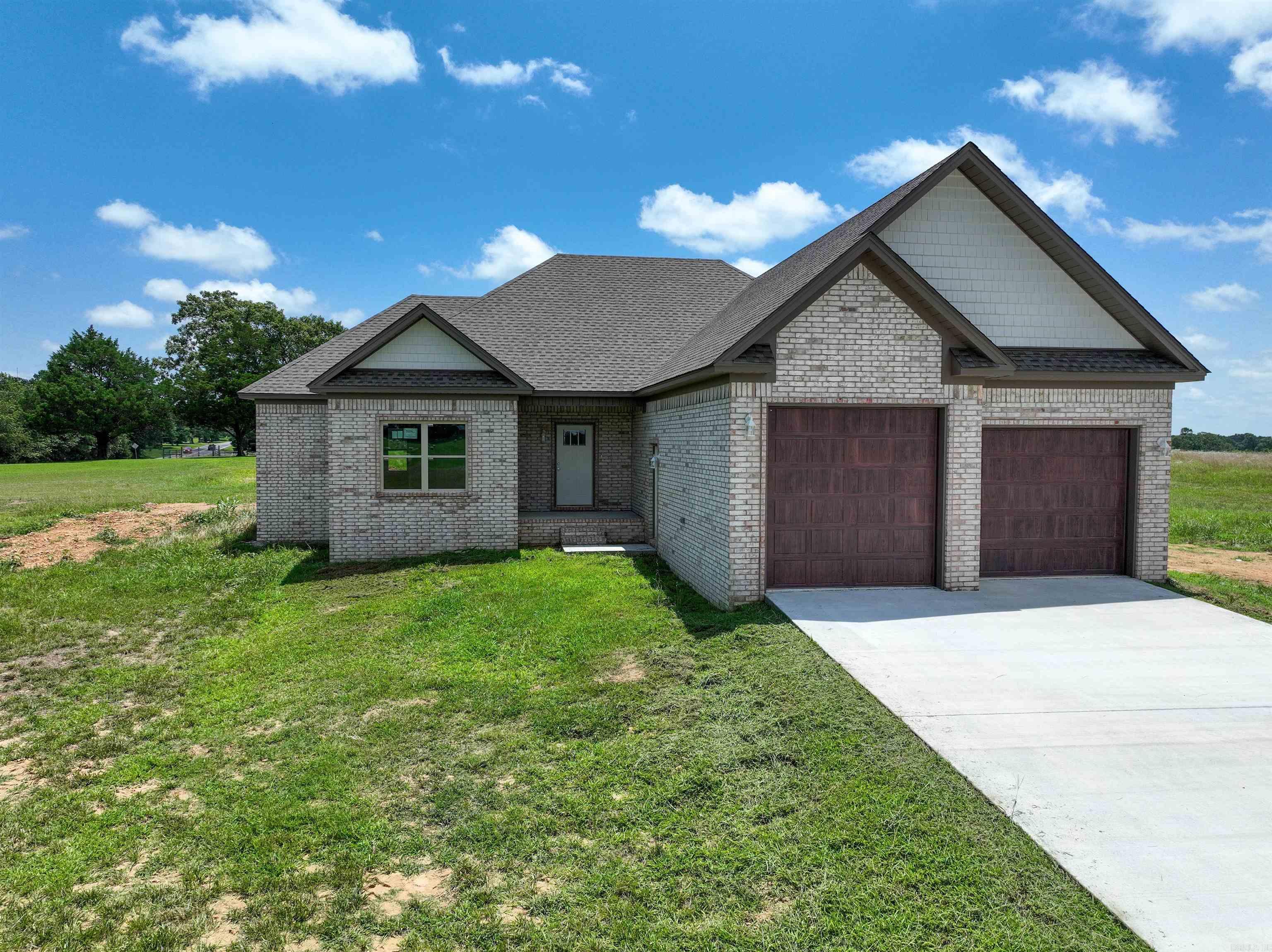 Nestled in the serene Joy Mountain Lake Estates, this newly built home offers access to a private 7-acre lakeāperfect for peaceful living and outdoor enjoyment. Situated on a spacious 1.28-acre lot, the property is just 12 miles from Searcy, blending country tranquility with convenience. This thoughtfully designed home features 3 bedrooms, 2 full baths, and a small officeāideal for remote work or a quiet study space, lots of extra outlets. The open-concept kitchen boasts an abundance of white cabinetry, sleek quartz countertops, a walk-in pantry with outlets, and modern finishes throughout. Lots of recessed lights. Enjoy the benefits of a split floor plan for added privacy, luxury vinyl plank flooring throughout (no carpet), and extra storage with additional closets. The oversized two-car garage provides ample space for vehicles and more. With neutral tones throughout, this home is a perfect canvas to personalize and make your own. Just a few things left to complete but ready for a buyer!!